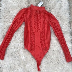 BEBE Coral cut out bodysuit NWT